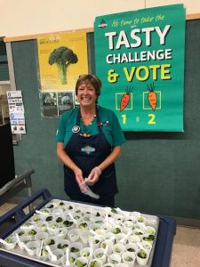 Tracy prepping sample cups for a Tasty Challenge.