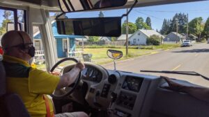 Transportation Director Driving Electric School Bus