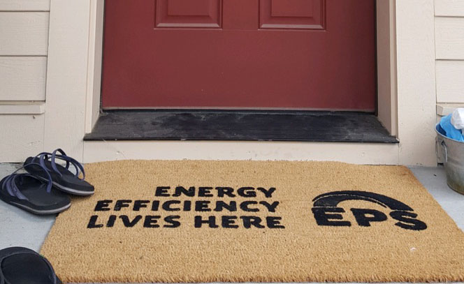 a welcome mat that reads energy efficiency lives here