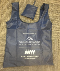 reusable vinyl tote bag with council on aging of central oregon logo