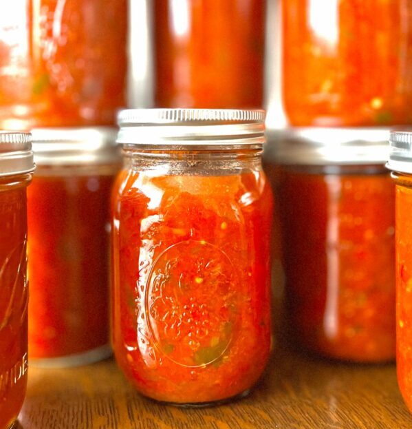 jars of preserved tomato sauce stacked up