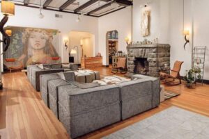 Pretty SCP Redmond hotel lounge with sofas and fireplace