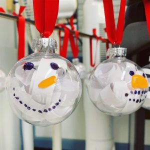 Adorable handmade glass globe snowman