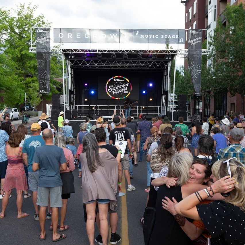 Photo at Bend SummerFeset with lots of people in front of a stage